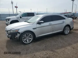 2013 Ford Taurus Limited with VIN 1FAHP2F87DG110201, listed as a Copart auction lot 60781725 with 215,611 mi miles and Clean title. Bid and sale history available at DreamBid. Image 1.