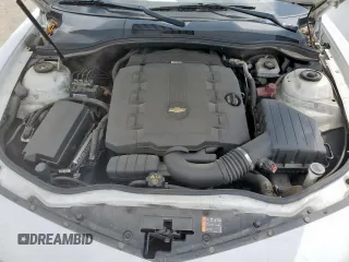 2014 Chevrolet Camaro LS z VIN 2G1FA1E39E9290972, wystawiony jako Copart lot #56696385 z przebiegiem 132 253 mil mil oraz Szkoda całkowita • Salvage title. Historia ofert i sprzedaży dostępna na DreamBid. Obrazek 11.