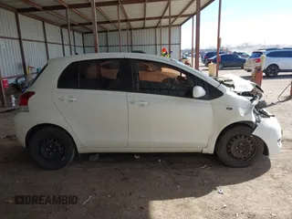 2009 Toyota Yaris with VIN JTDKT903295244862, listed as a IAAI auction lot 41616299 with 213,078 mi miles and . Bid and sale history available at DreamBid. Image 13.