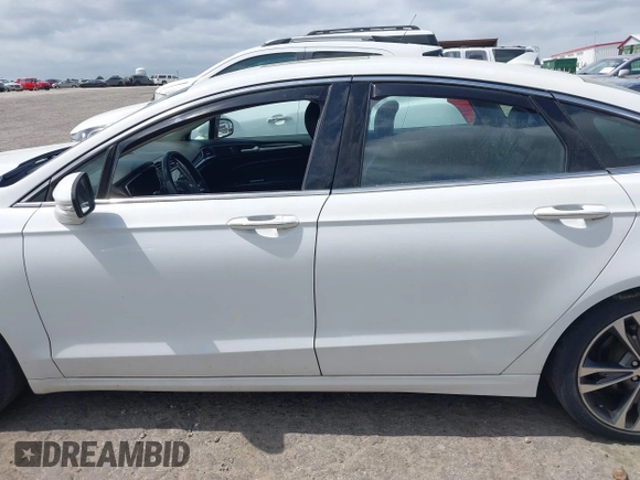 2019 Ford Fusion Titanium with VIN 3FA6P0D91KR140260, listed as a IAAI auction lot 41931629 with 95,207 mi miles. Bid and sale history available at carsss.com. Image 14.