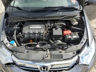 2013 Honda Insight with VIN JHMZE2H36DS002735, listed as a Copart auction lot 73602064 with 112,967 mi miles and Salvage title. Bid and sale history available at DreamBid. Image 11.