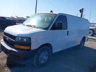 2018 Chevrolet Express Cargo Van with VIN 1GCWGAFP0J1182701, listed as a IAAI auction lot 42014825 with 206,702 mi miles. Bid and sale history available at carsss.com. Image 14.