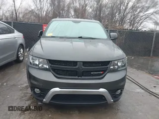 2017 Dodge Journey Crossroad Plus z VIN 3C4PDCGB5HT501363, wystawiony jako IAAI lot #41178334 z przebiegiem 119 076 mil mil oraz . Historia ofert i sprzedaży dostępna na DreamBid. Obrazek 13.