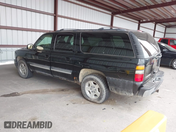 2004 Chevrolet Suburban LT with VIN 1GNEC16Z44J332278, listed as a IAAI auction lot 41902358 with 372,990 mi miles. Bid and sale history available at carsss.com. Image 3.