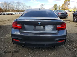 2015 BMW 2 Series M235i xDrive with VIN WBA1J9C5XFV370961, listed as a Copart auction lot 78313054 with 99,245 mi miles and Salvage Title. Bid and sale history available at carsss.com. Image 6.