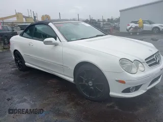 2006 Mercedes-Benz CLK-Class 5.0L with VIN WDBTK75G36T066621, listed as a IAAI auction lot 41009612 with 135,931 mi miles. Bid and sale history available at carsss.com. Image 1.