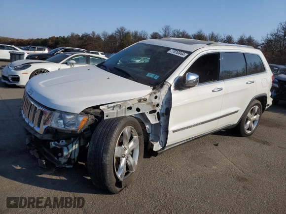 2013 Jeep Grand Cherokee Overland with VIN 1C4RJFCG8DC639408, listed as a Copart auction lot 77910444 with 89,623 mi miles and Salvage Title. Bid and sale history available at carsss.com. Image 1.