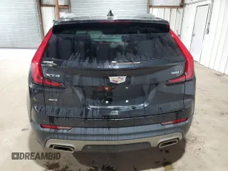 2021 Cadillac XT4 AWD Premium Luxury z VIN 1GYFZDR41MF001099, wystawiony jako Copart lot #48744655 z przebiegiem 57 633 mil mil oraz Tytuł czysty. Historia ofert i sprzedaży dostępna na DreamBid. Obrazek 6.
