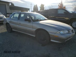 1996 Pontiac Grand Am SE2 with VIN 1G2NE52T3TC834038, listed as a Copart auction lot 76610794 with 140,379 mi miles and Salvage Title. Bid and sale history available at carsss.com. Image 4.