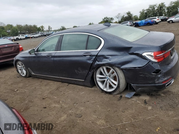 2016 BMW 7 Series 750i with VIN WBA7F0C54GGL99661, listed as a Copart auction lot 71742154 with 104,498 mi miles and Salvage Title. Bid and sale history available at carsss.com. Image 2.