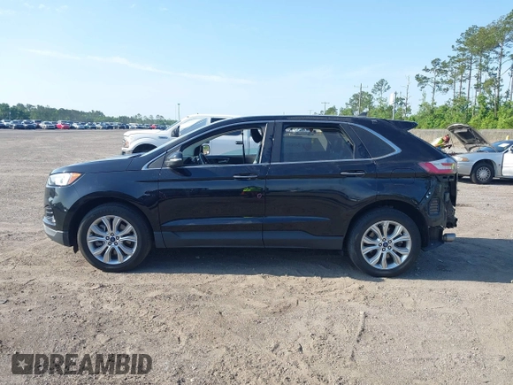 2022 Ford Edge Titanium with VIN 2FMPK4K99NBA45354, listed as a IAAI auction lot 42187761 with 75,458 mi miles and . Bid and sale history available at DreamBid. Image 14.