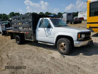 1997 Chevrolet Silverado 3500 z VIN 1GBJK34R1VF054943, wystawiony jako Copart lot #68689614 z przebiegiem 67 852 mil mil oraz Szkody całkowita. Historia ofert i sprzedaży dostępna na DreamBid. Obrazek 4.