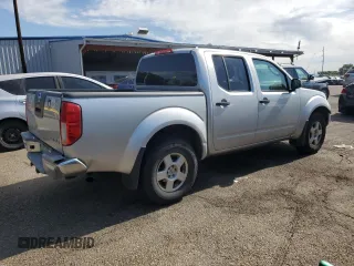 2007 Nissan Frontier Nismo with VIN 1N6AD07W17C401565, listed as a Copart auction lot 64868285 with 201,327 mi miles and Clean title. Bid and sale history available at DreamBid. Image 3.