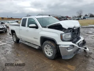 2019 GMC Sierra 1500 Limited SLE with VIN 2GTV2MEC1K1182101, listed as a Copart auction lot 43940555 with 89,520 mi miles and Salvage Title. Bid and sale history available at carsss.com. Image 4.