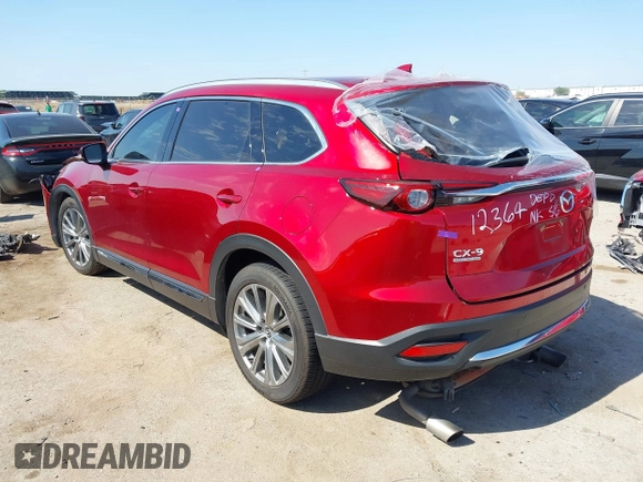 2021 Mazda CX-9 Signature with VIN JM3TCBEY9M0500122, listed as a IAAI auction lot 42252561 with 46,154 mi miles and . Bid and sale history available at DreamBid. Image 3.