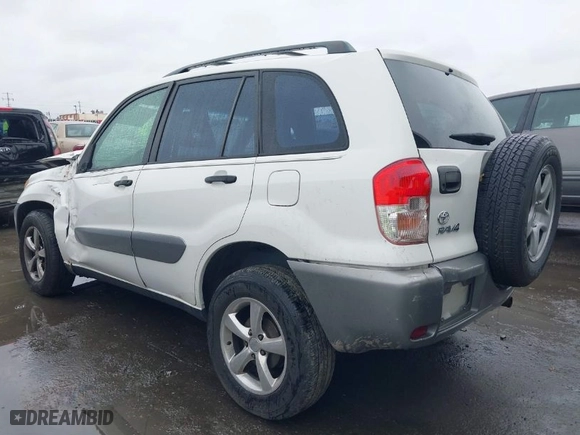 2003 Toyota RAV4 with VIN JTEGH20V730119789, listed as a IAAI auction lot 41809263 with 140,028 mi miles. Bid and sale history available at carsss.com. Image 3.