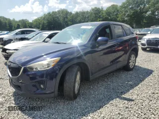 2014 Mazda CX-5 Touring with VIN JM3KE2CY8E0340227, listed as a Copart auction lot 64288695 with 113,934 mi miles and Clean title. Bid and sale history available at DreamBid. Image 1.