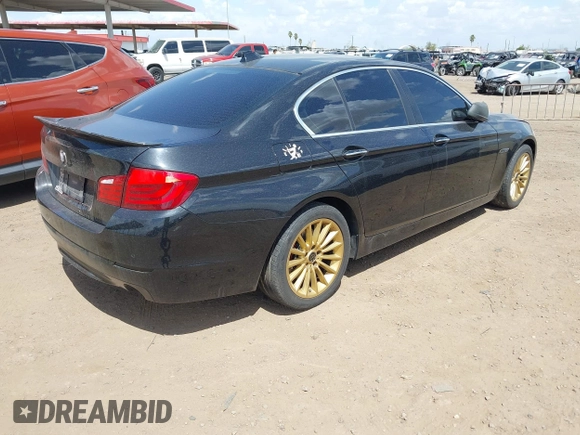 2013 BMW 5 Series 535i xDrive with VIN WBAFU7C51DDU73061, listed as a IAAI auction lot 41960663 with 106,591 mi miles and . Bid and sale history available at carsss.com. Image 4.