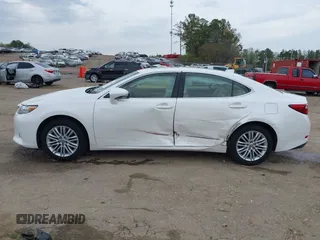 2015 Lexus ES 330 with VIN JTHBK1GGXF2209513, listed as a IAAI auction lot 41910570 with 141,084 mi miles and . Bid and sale history available at DreamBid. Image 14.