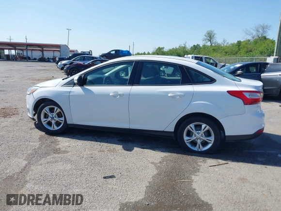 2013 Ford Focus SE with VIN 1FADP3F26DL203377, listed as a IAAI auction lot 41998750 with 70,000 mi miles. Bid and sale history available at carsss.com. Image 14.