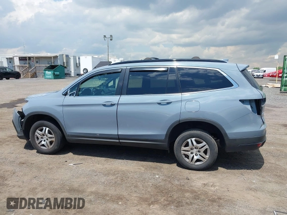 2022 Honda Pilot Special Edition with VIN 5FNYF6H27NB104990, listed as a IAAI auction lot 42219770 with 23,200 mi miles and . Bid and sale history available at DreamBid. Image 14.