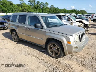 2009 Jeep Patriot Limited with VIN 1J4FT48B99D146489, listed as a Copart auction lot 52484925 with 251,986 mi miles and Salvage title. Bid and sale history available at DreamBid. Image 4.
