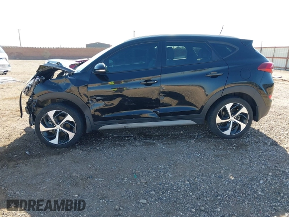 2017 Hyundai Tucson Sport z VIN KM8J33A23HU490270, wystawiony jako IAAI lot #42042967 z przebiegiem 121 660 mil mil oraz . Historia ofert i sprzedaży dostępna na DreamBid. Obrazek 14.