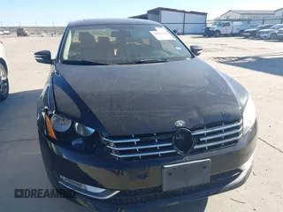2014 Volkswagen Passat SEL Premium with VIN 1VWCS7A39EC080409, listed as a IAAI auction lot 40917278 with 140,783 mi miles. Bid and sale history available at carsss.com. Image 6.