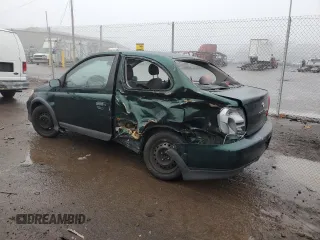 2000 Toyota ECHO with VIN JTDAT1231Y0041399, listed as a Copart auction lot 83774514 with 128,465 mi miles and Salvage Title. Bid and sale history available at DreamBid. Image 2.
