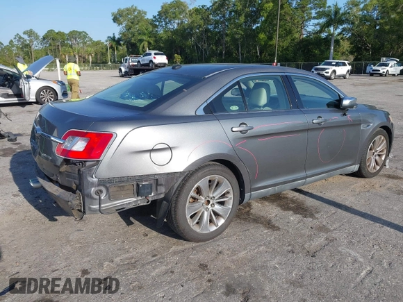 2011 Ford Taurus Limited with VIN 1FAHP2FW3BG117688, listed as a IAAI auction lot 41974469 with 215,036 mi miles and . Bid and sale history available at carsss.com. Image 4.