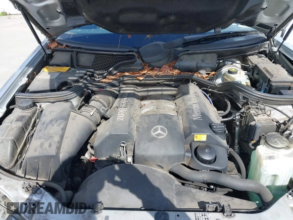 1998 Mercedes-Benz E-Class with VIN WDBJF65F5WA702626, listed as a IAAI auction lot 42014815 with 113,632 mi miles. Bid and sale history available at carsss.com. Image 10.