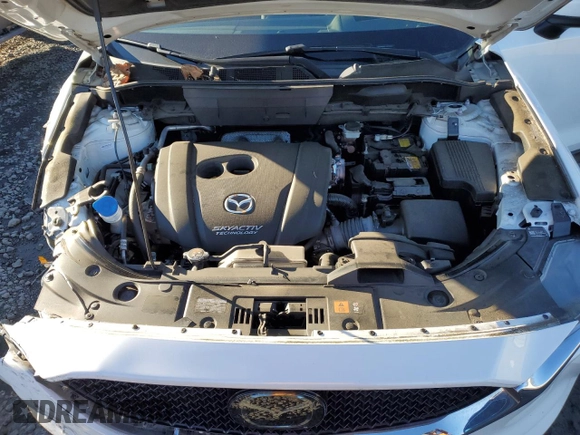 2018 Mazda CX-5 Grand Touring z VIN JM3KFBDM6J0337006, wystawiony jako Copart lot #87155694 z przebiegiem 50 643 mil mil oraz Szkoda całkowita • Salvage title. Historia ofert i sprzedaży dostępna na DreamBid. Obrazek 11.