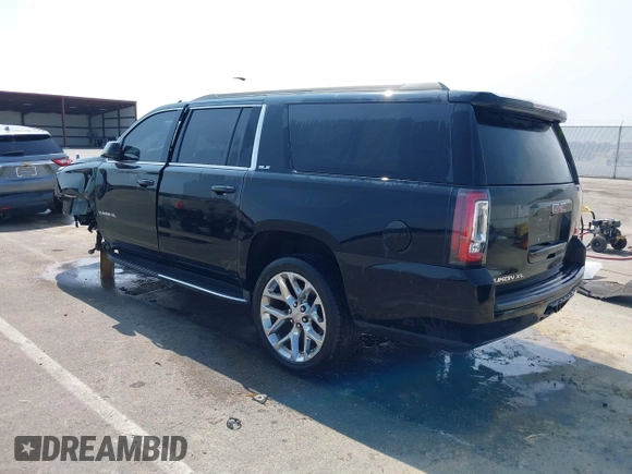 2016 GMC Yukon XL SLE with VIN 1GKS1FKC9GR161876, listed as a IAAI auction lot 39948106 with 60,800 mi miles. Bid and sale history available at carsss.com. Image 3.