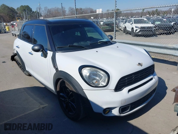 2014 MINI Countryman S with VIN WMWZC3C52EWP25060, listed as a IAAI auction lot 41642855 with 240,396 mi miles and . Bid and sale history available at DreamBid. Image 1.