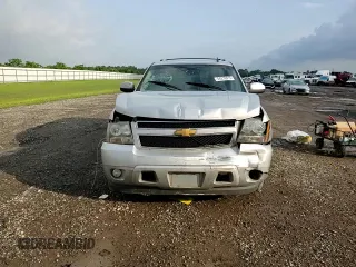 2012 Chevrolet Suburban LT z VIN 1GNSCJE01CR128642, wystawiony jako Copart lot #54210515 z przebiegiem Nie podano mil oraz Szkoda całkowita • Salvage title. Historia ofert i sprzedaży dostępna na DreamBid. Obrazek 14.
