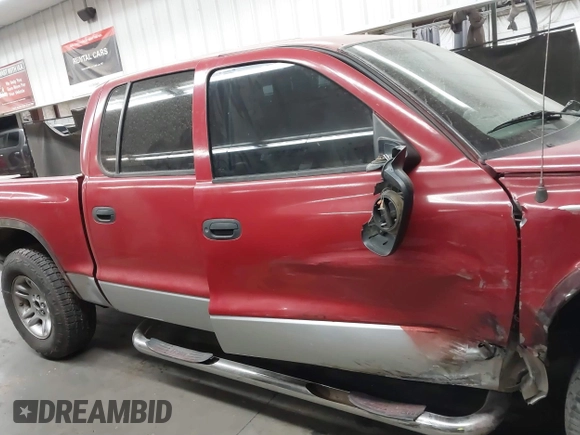 2001 Dodge Dakota Sport with VIN 1B7HL2AN81S296293, listed as a IAAI auction lot 41470036 with 203,323 mi miles. Bid and sale history available at carsss.com. Image 14.