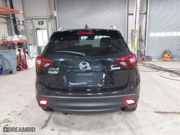 2016 Mazda CX-5 Grand Touring with VIN JM3KE2DY9G0635368, listed as a IAAI auction lot 41699616 with 240,619 mi miles. Bid and sale history available at carsss.com. Image 17.