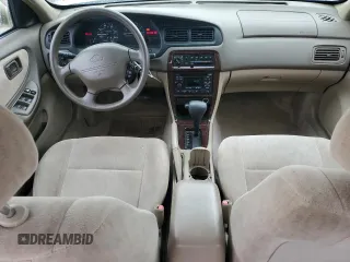 1998 Nissan Altima XE z VIN 1N4DL01D4WC217607, wystawiony jako Copart lot #55434615 z przebiegiem 182 205 mil mil oraz Szkoda całkowita • Salvage title. Historia ofert i sprzedaży dostępna na DreamBid. Obrazek 8.