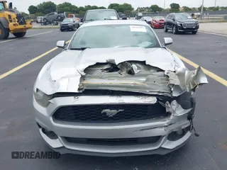 2015 Ford Mustang V6 z VIN 1FA6P8AM1F5316868, wystawiony jako IAAI lot #42618687 z przebiegiem 93 238 mil mil oraz . Historia ofert i sprzedaży dostępna na DreamBid. Obrazek 13.