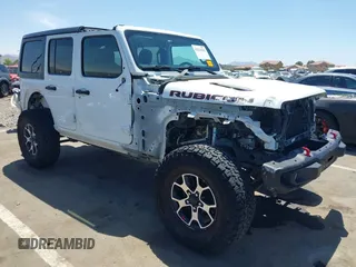 2021 Jeep Wrangler Unlimited Rubicon with VIN 1C4HJXFGXMW850556, listed as a IAAI auction lot 42234282 with 80,834 mi miles and . Bid and sale history available at DreamBid. Image 1.