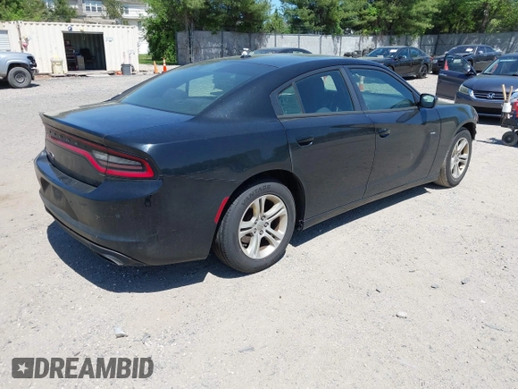 2015 Dodge Charger SE with VIN 2C3CDXBG9FH790573, listed as a IAAI auction lot 42142908 with 195,182 mi miles and . Bid and sale history available at carsss.com. Image 4.