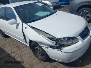 2002 Nissan Sentra GXE z VIN 3N1CB51D12L649594, wystawiony jako IAAI lot #41758242 z przebiegiem 274 883 mil mil oraz . Historia ofert i sprzedaży dostępna na DreamBid. Obrazek 6.