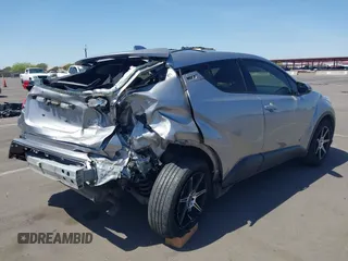 2020 Toyota C-HR LE with VIN JTNKHMBX4L1088502, listed as a IAAI auction lot 41982312 with 69,160 mi miles and . Bid and sale history available at DreamBid. Image 6.