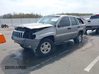 2000 Jeep Grand Cherokee Laredo with VIN 1J4GW48N5YC322707, listed as a IAAI auction lot 42080677 with Not provided miles and . Bid and sale history available at DreamBid. Image 2.