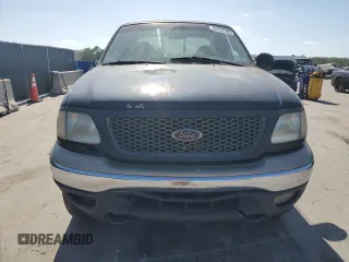 2000 Ford F-150 XL with VIN 1FTRX18L0YNB65908, listed as a Copart auction lot 54797585 with 298,924 mi miles and Clean title. Bid and sale history available at DreamBid. Image 5.