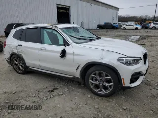 2021 BMW X3 xDrive30i with VIN 5UXTY5C08M9F38091, listed as a Copart auction lot 52566775 with Not Provided miles and Salvage Title. Bid and sale history available at DreamBid. Image 4.