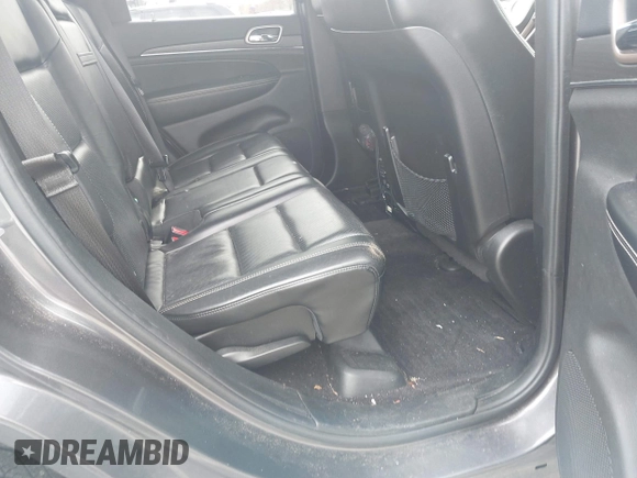 2016 Jeep Grand Cherokee Limited 75th Anniversary with VIN 1C4RJFBG5GC497766, listed as a IAAI auction lot 42048662 with 164,281 mi miles and . Bid and sale history available at DreamBid. Image 8.