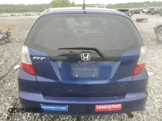 2013 Honda Fit с VIN JHMGE8H36DC064995, выставлен на аукционе Copart как лот 55129035 с пробегом Не указан миль и Списание • Salvage title. История ставок и продаж доступна на DreamBid. Изображение 6.