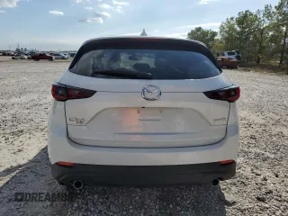 2023 Mazda CX-5 2.5 S Premium Package with VIN JM3KFBDM4P0217729, listed as a Copart auction lot 85883354 with 18,116 mi miles and Salvage Title. Bid and sale history available at carsss.com. Image 6.