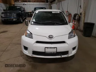 2014 Scion xD with VIN JTKKUPB48E1046627, listed as a Copart auction lot 61498995 with 63,452 mi miles and Salvage title. Bid and sale history available at DreamBid. Image 5.